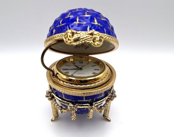 Uovo Fabergé in smalto con orologio e supporto - Gioielleria De Vitis Sabaudia - dettaglio aperto